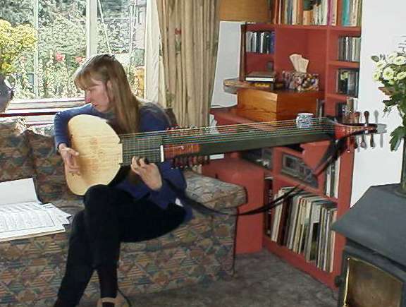 Lynda Sayce playing the theorbo